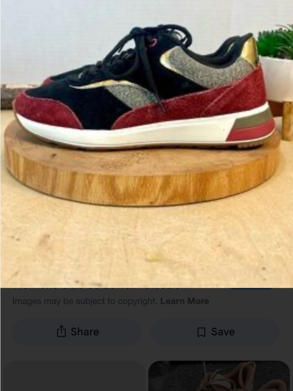 Women's Black and Burgundy Fashion Sneaker with Gold Accent